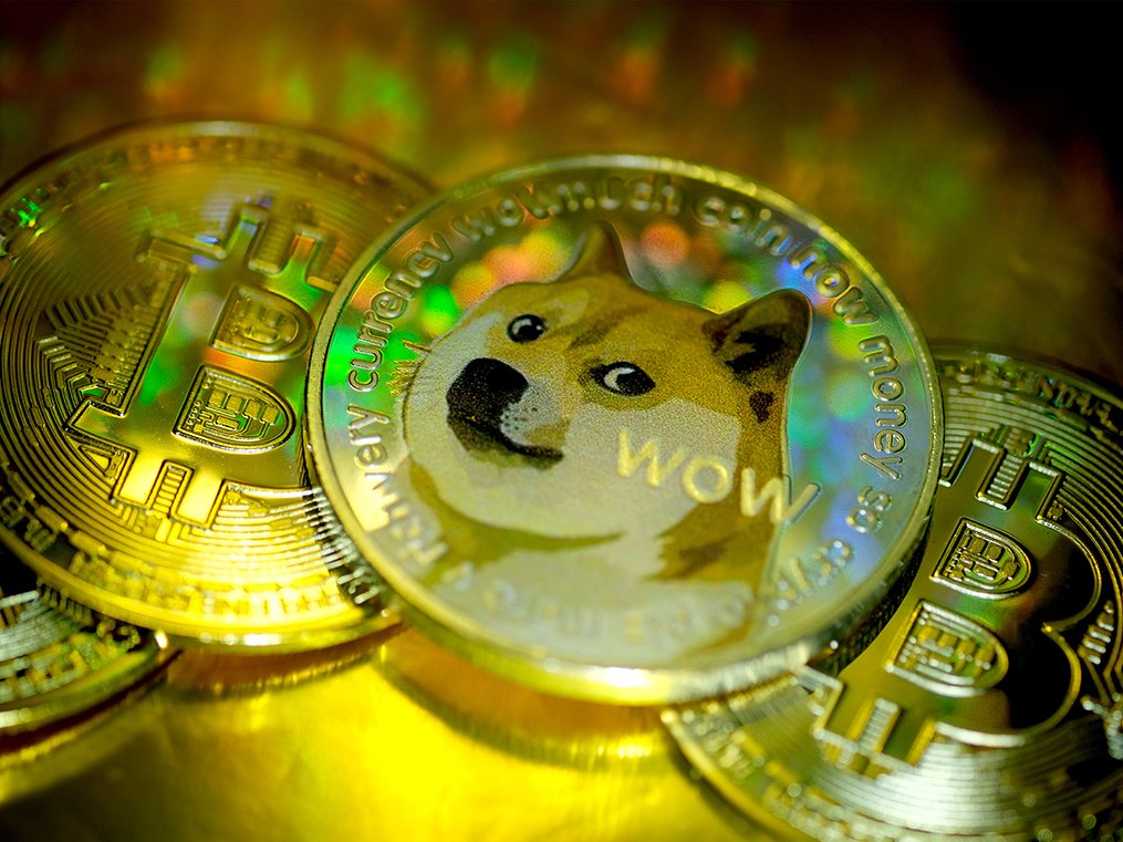 KATWIJK, NETHERLANDS - JANUARY 29: In this photo illustration visual representations of digital cryptocurrencies, Dogecoin and Bitcoin, are displayed on January 29, 2021 in Katwijk, Netherlands.  (Photo by Yuriko Nakao/Getty Images)