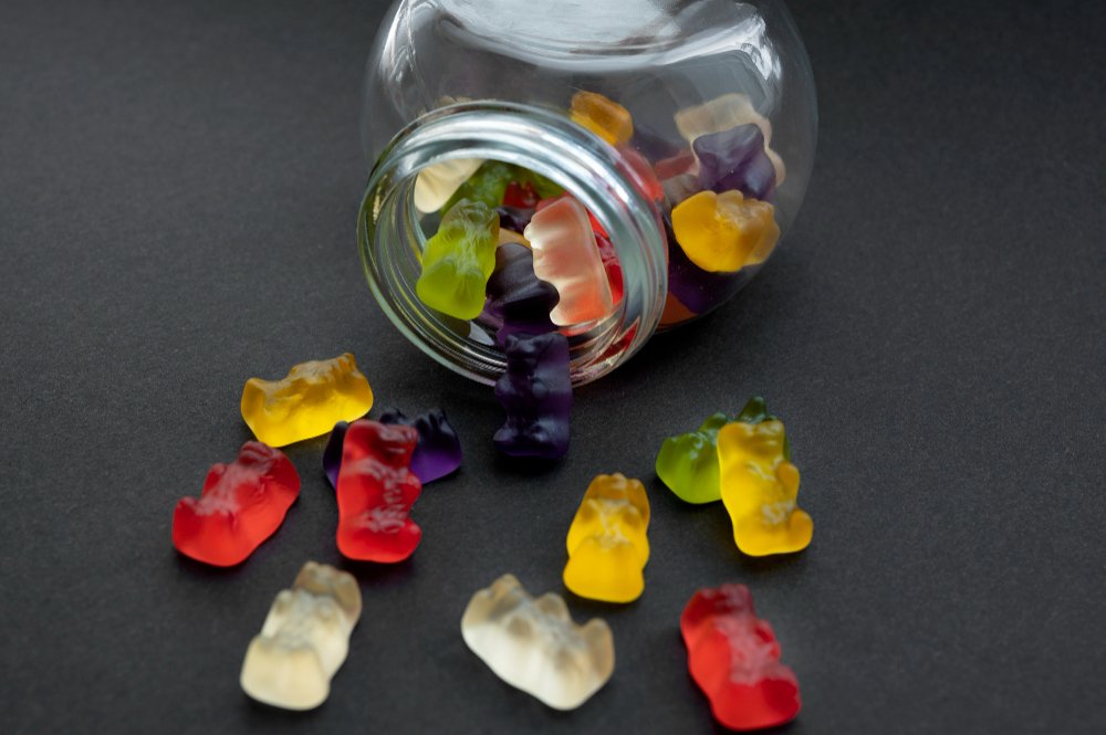 assortment delicious gummy bears with glass jar