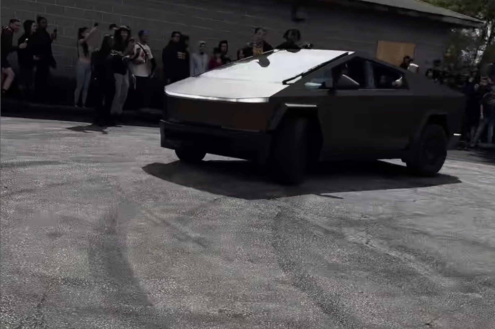 Tesla Cybertruck Crashes Into Crowd During Donuts Attempt