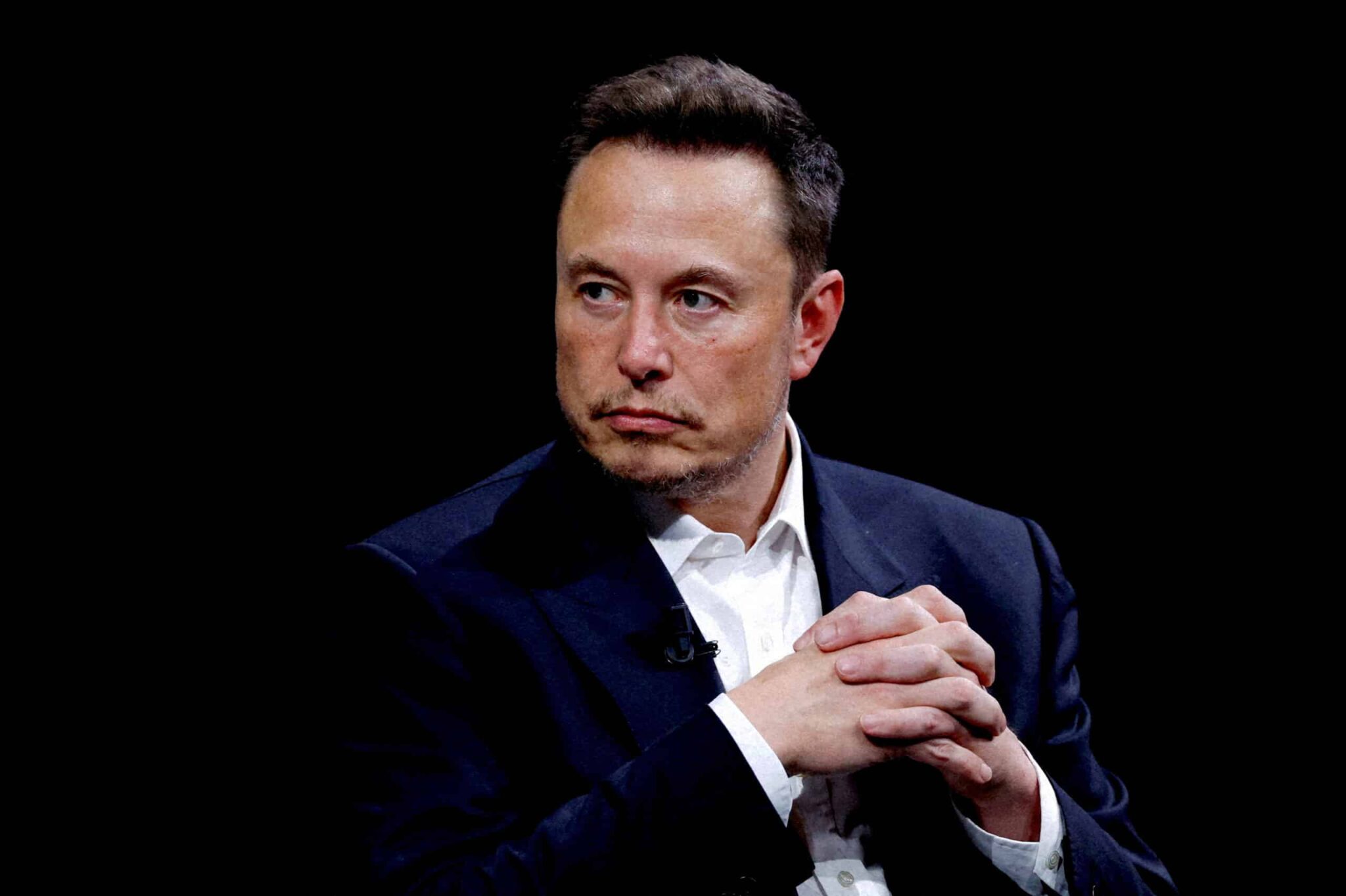 Tesla's Legal Maneuver: Bid to Postpone Hearing on Musk's Compensation Package
